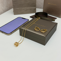 Serpenti Necklace And Earrings